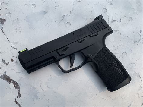 A.22 pistol with a beautifully crafted grip