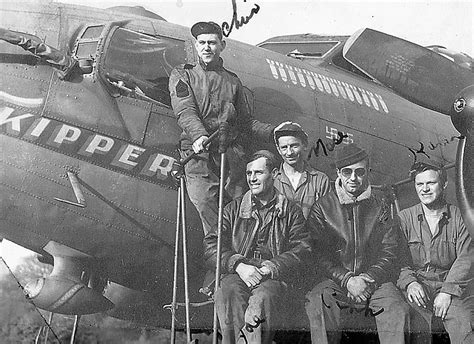 100th Air Group crew posing in front of B-17