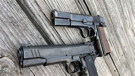 1911 and Hi-Power pistols side by side