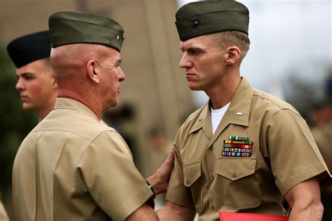 A Marine from 2nd Battalion, 7th Marines receiving an award