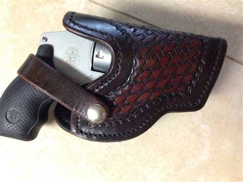 A selection of holsters for the.38 Special P revolver