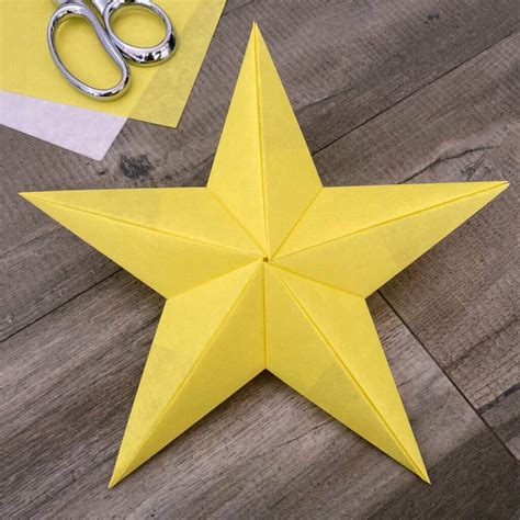 A single 3D paper star made from white paper