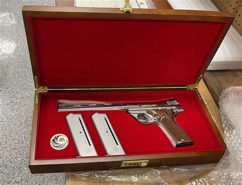 A 44 Automag pistol, displayed in a custom case