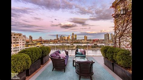 Residents enjoying the rooftop lounge