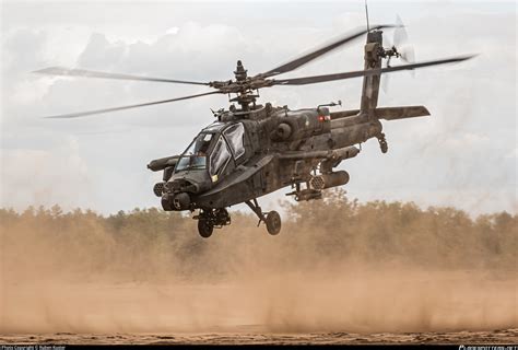 AH-64 Apache firing Hellfire missiles