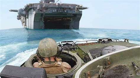 Aircraft carrier being recovered from a beaching operation.