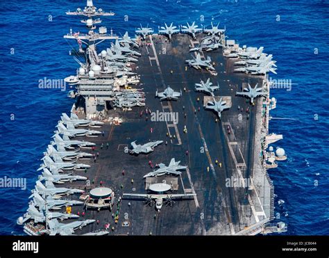 Aircraft launching and recovering from the USS Ronald Reagan