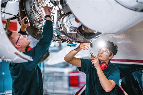 Aircraft maintenance personnel at work