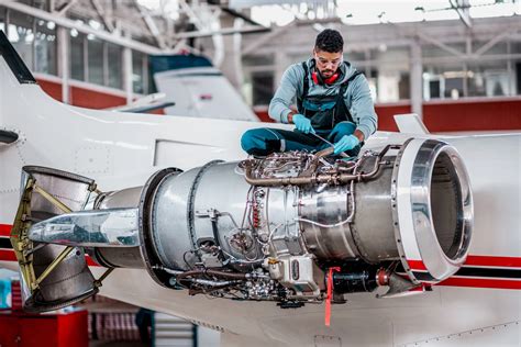 Aircraft Mechanic working on a plane