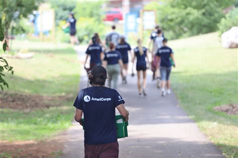 Americorps members serving in a community