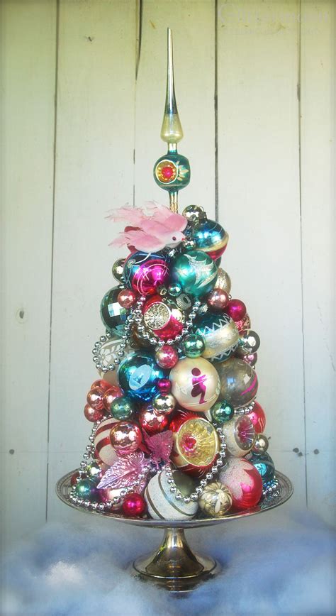 A Christmas tree decorated with antique ornaments