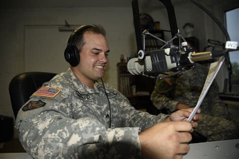 Communications Specialist working on radio