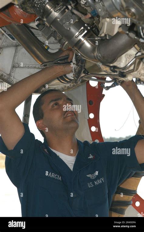 Aviation Machinist's Mate operating an aircraft engine