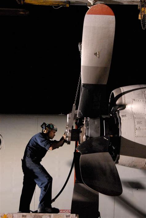 Aviation Machinist Mate rebuilding an engine