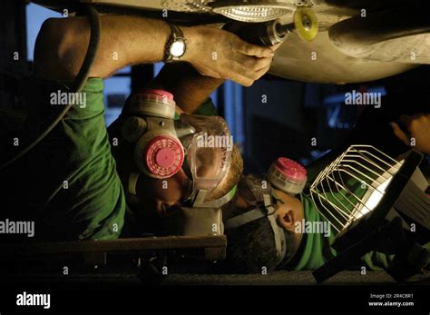 Aviation Machinist Mate using tools