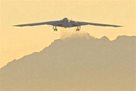 A B-21 stealth bomber taking off