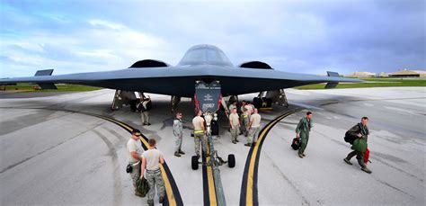 Technicians working on the B-2 Spirit, demonstrating its high level of sophistication