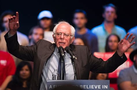 Bernie Sanders speaking at a podium with a social media filter