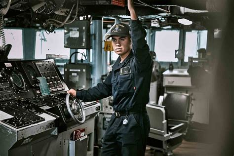 Boatswain's Mate operating a crane