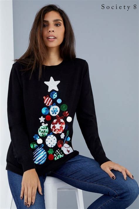 A person wearing a personalized Christmas jumper