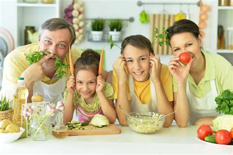 A couple using a cooking together guide