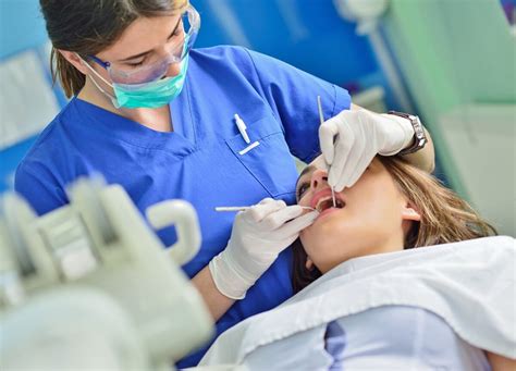 Dental Hygienist Working