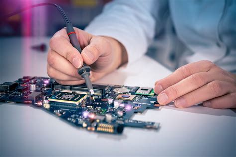 Electronics Technician repairing electronic equipment