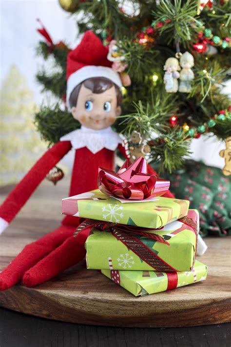 Elf with presents coloring page