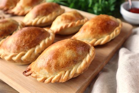 Empanadas, flaky pastry pockets filled with meat or cheese