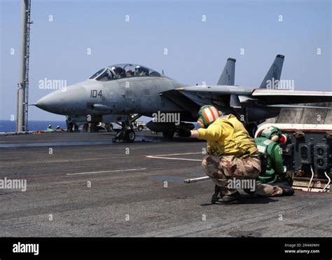 F-14 on the flight deck of an aircraft carrier