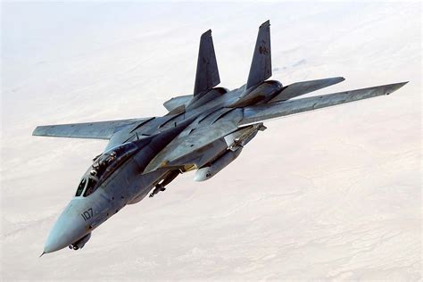 F-14 in flight with afterburners engaged