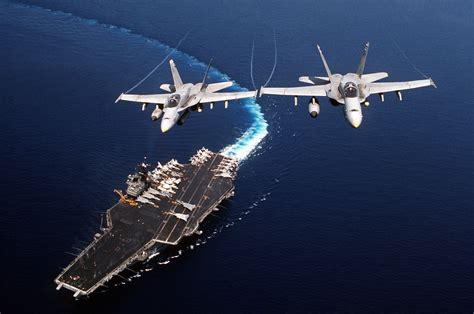 F-18 Flying Over Aircraft Carrier