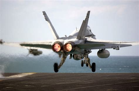 F-18 fighter jet taking off