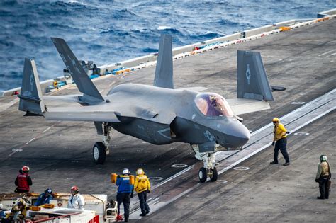 An F-35C Lightning II aircraft taking off from the USS George H.W. Bush