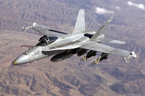 F-18 Fighter Jet taking off from an aircraft carrier