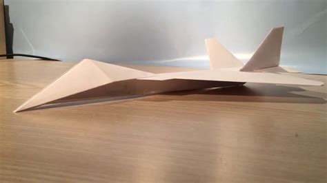 A stylized F-22 paper airplane design