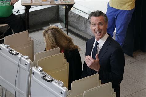 Gavin Newsom speaking at a rally