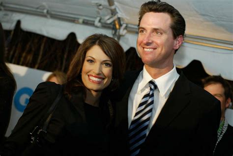 Gavin Newsom with a journalist