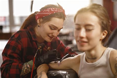 Client getting a tattoo in Paris