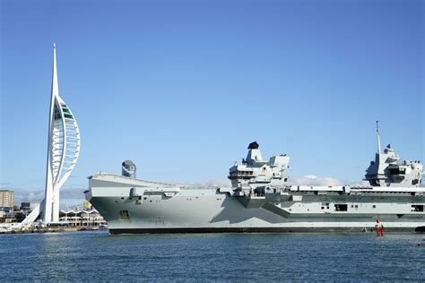 HMS Queen Elizabeth aircraft carrier sailing through the sea