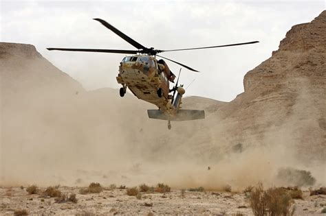 Helicopter landing in desert