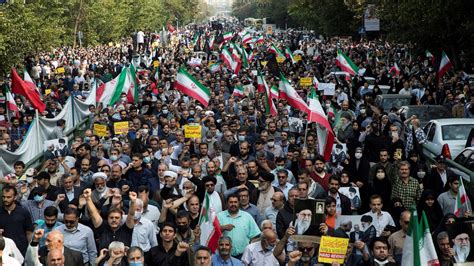 Iranian protesters marching in the streets