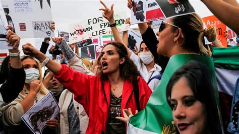 Protesters in a foreign country showing solidarity with Iranian protesters