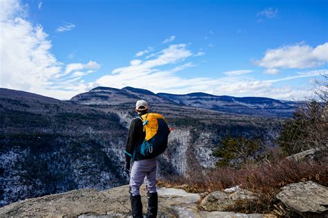 A photo of a person hiking in the mountains