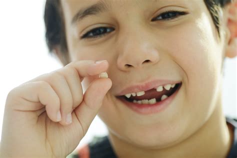 Losing First Tooth