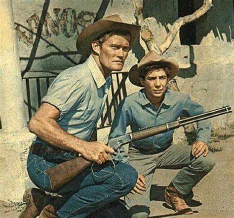 Chuck Connors and Johnny Crawford as Lucas and Mark McCain