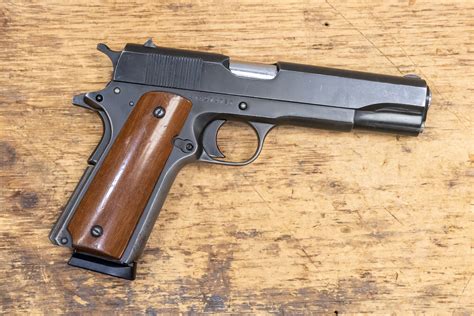 M1911 pistol in use, a reliable sidearm for American soldiers