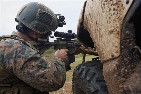 MARSOC operator providing humanitarian aid