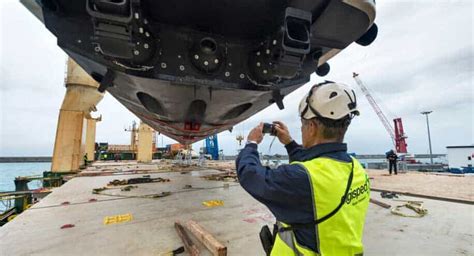 Marine Surveyor inspecting a ship's hull