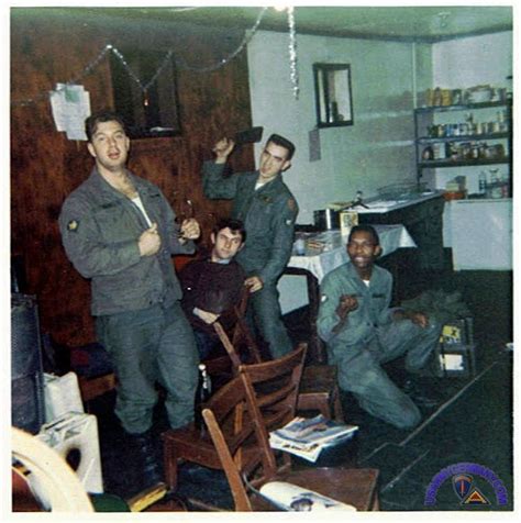 Marines standing at attention in the barracks